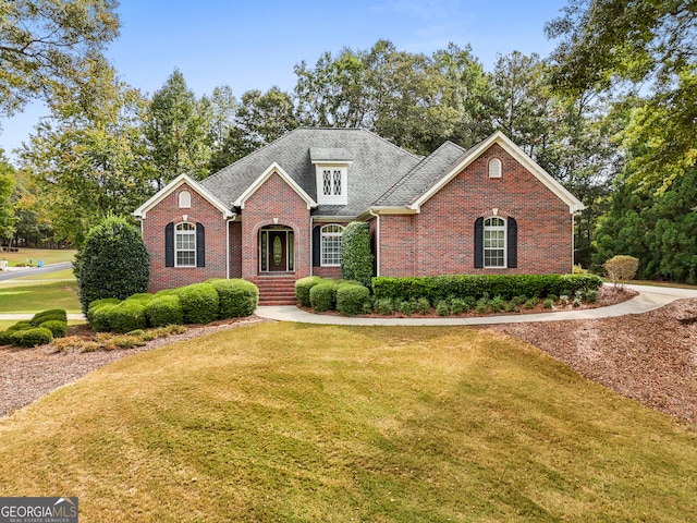 view of property featuring a front yard