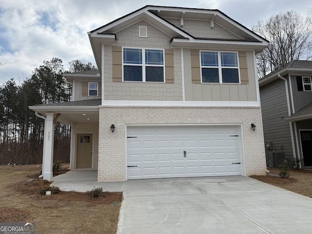 view of front facade with an attached garage, central AC unit, concrete driveway, and brick siding