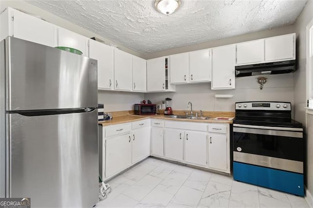 kitchen with stainless steel appliances and white cabinets