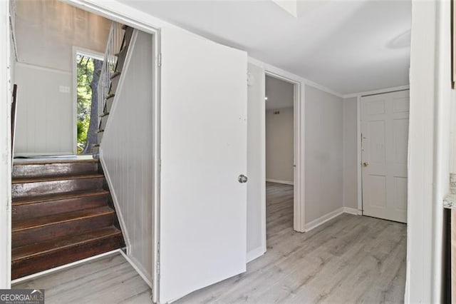 stairs with wood-type flooring