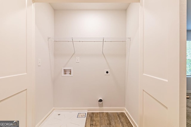 washroom with laundry area, baseboards, dark wood-style flooring, hookup for an electric dryer, and washer hookup