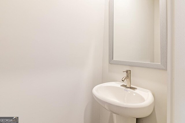 bathroom featuring vanity, toilet, and hardwood / wood-style flooring