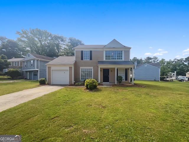 view of front facade featuring an attached garage, driveway, a front lawn, and a porch