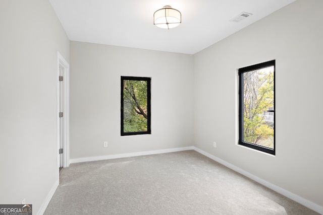 view of carpeted spare room