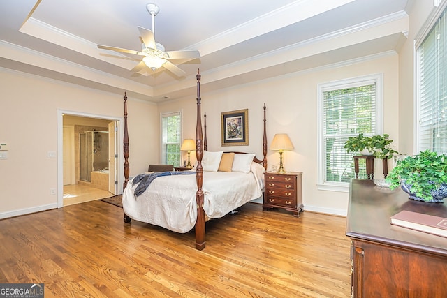 bedroom with ceiling fan, light wood-type flooring, crown molding, and multiple windows