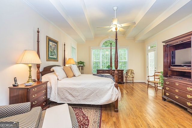 bedroom with ceiling fan, light wood-type flooring, and crown molding