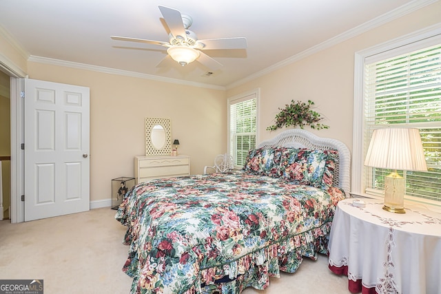 bedroom featuring ceiling fan, light carpet, and ornamental molding