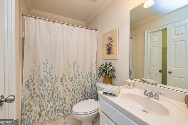 bathroom featuring ornamental molding, vanity, toilet, and tile patterned floors