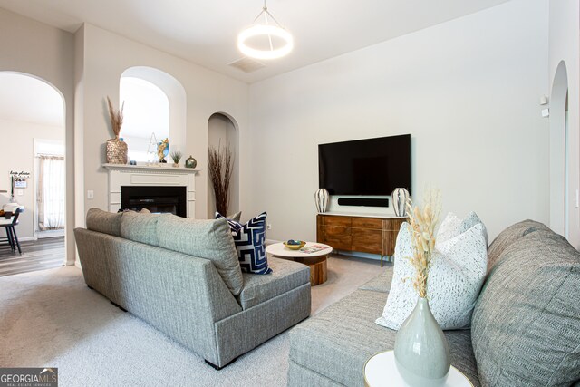 living room with light colored carpet