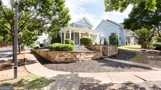 view of front of house with a porch and a garage