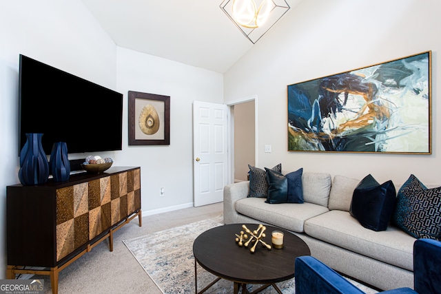 living room featuring light carpet and vaulted ceiling