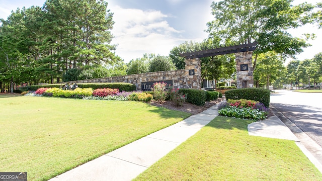 view of community with a lawn