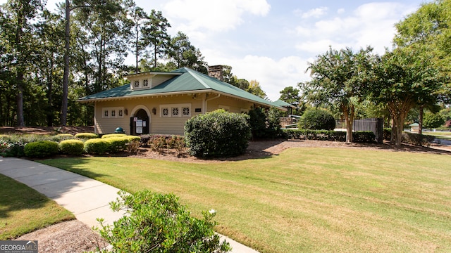 view of home's exterior featuring a lawn