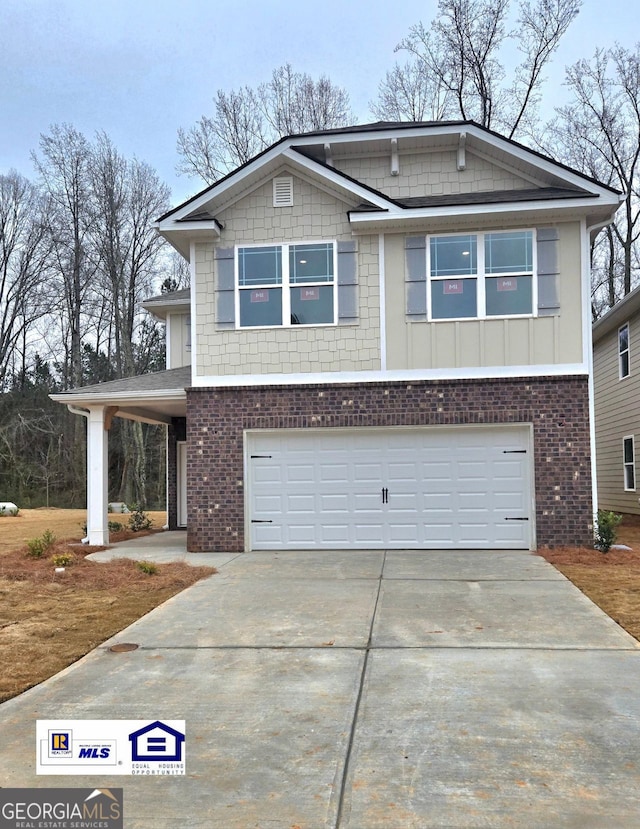 view of front of property with a garage