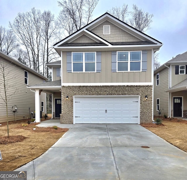 view of front of property with a garage