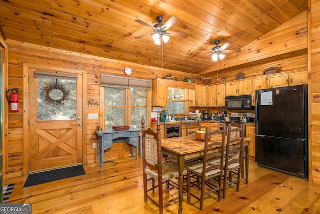 dining room with wood ceiling, light hardwood / wood-style floors, vaulted ceiling, and ceiling fan