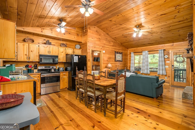 kitchen featuring lofted ceiling, black appliances, ceiling fan, and light hardwood / wood-style floors