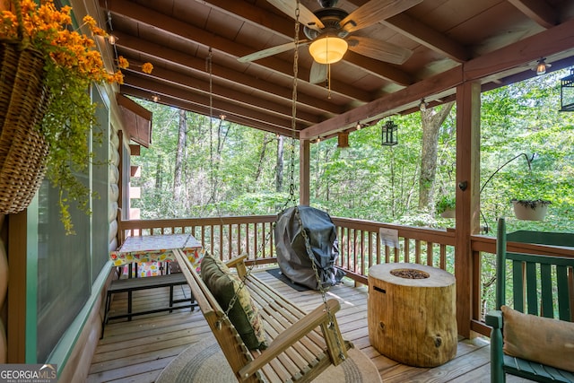 deck featuring ceiling fan and grilling area