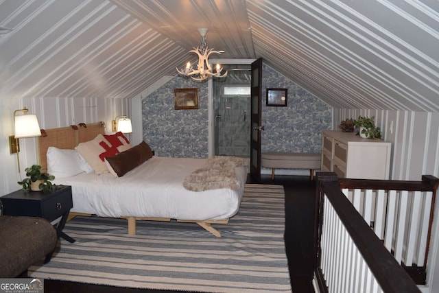 bedroom featuring lofted ceiling and a notable chandelier