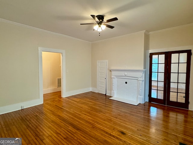 unfurnished living room with french doors, ornamental molding, ceiling fan, and hardwood / wood-style floors