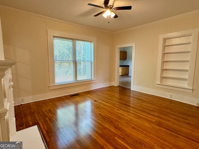 unfurnished living room with crown molding, hardwood / wood-style floors, ceiling fan, and built in features