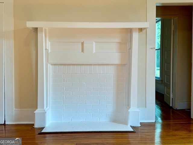 interior details featuring wood-type flooring