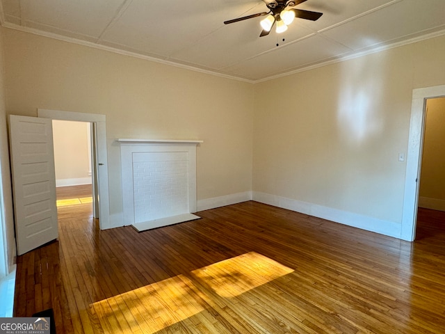 unfurnished room featuring ornamental molding, ceiling fan, and hardwood / wood-style flooring