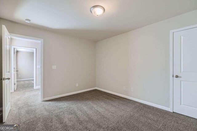 spare room with carpet