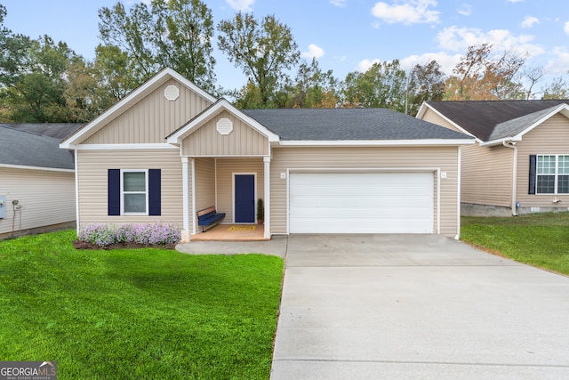 ranch-style house with a garage and a front yard