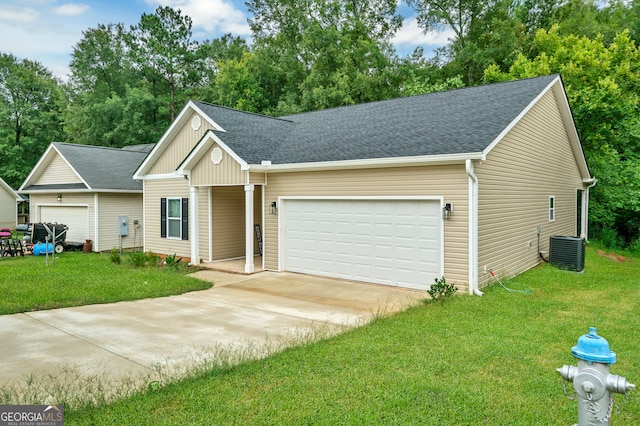 single story home with central AC, a front yard, and a garage