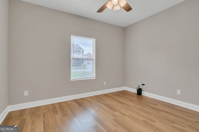 unfurnished room with ceiling fan and light hardwood / wood-style floors