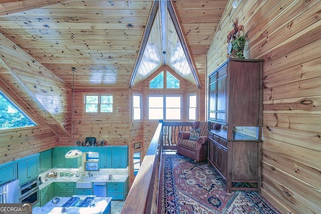 interior space with wood walls and wooden ceiling