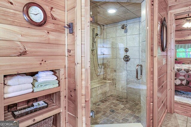 bathroom featuring an enclosed shower and vanity