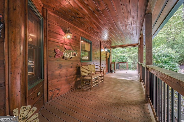 wooden deck featuring covered porch