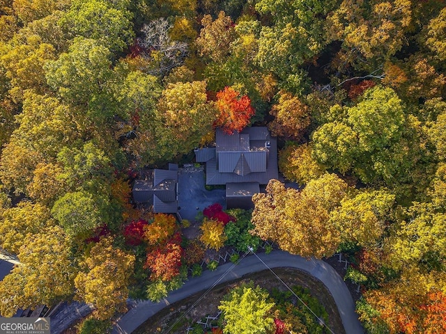 drone / aerial view with a forest view