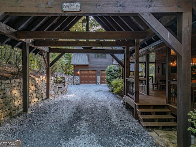 exterior space featuring an outdoor structure and a deck