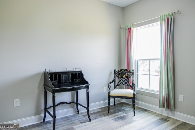 sitting room with light wood-type flooring