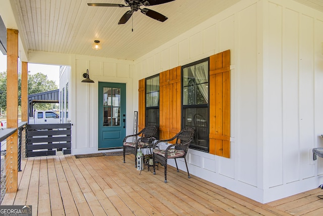 wooden deck with ceiling fan