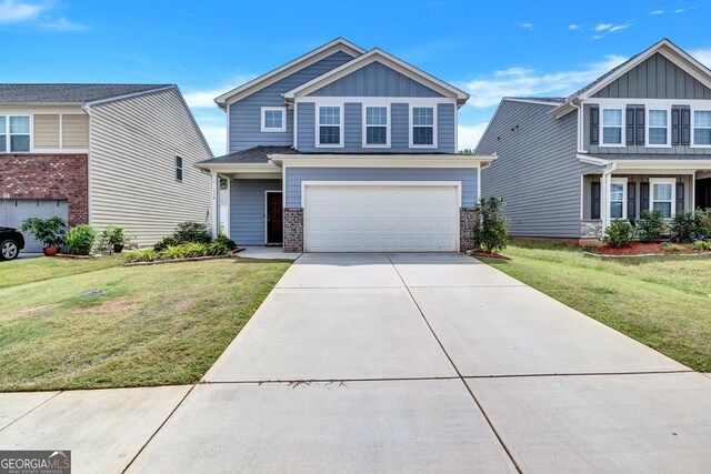 craftsman-style house with a front yard and a garage