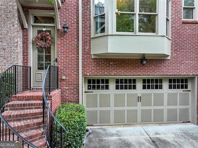 entrance to property with a garage