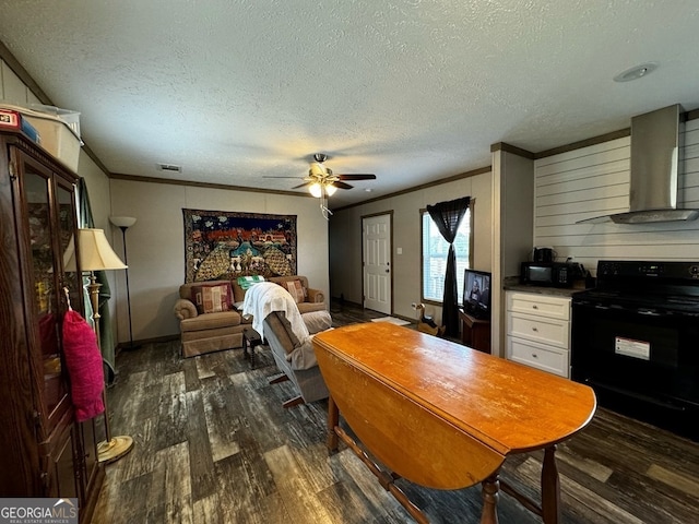 interior space featuring a textured ceiling, crown molding, dark hardwood / wood-style flooring, and ceiling fan