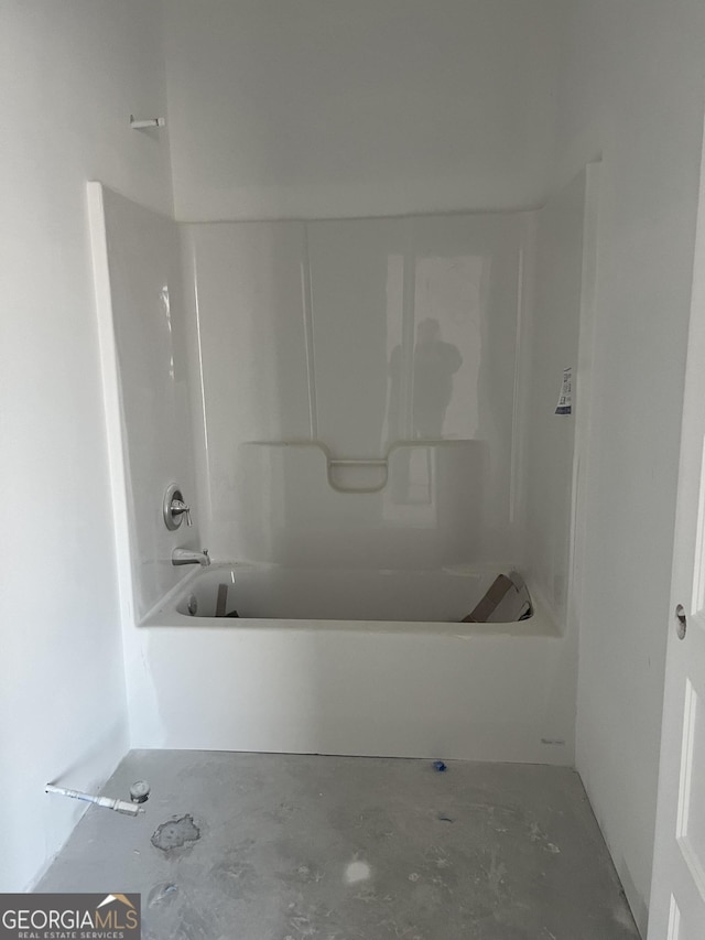 bathroom featuring  shower combination