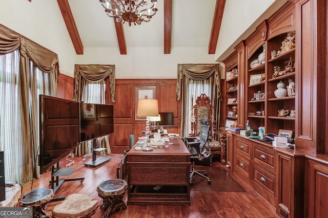 office space with lofted ceiling with beams, dark hardwood / wood-style flooring, and a notable chandelier