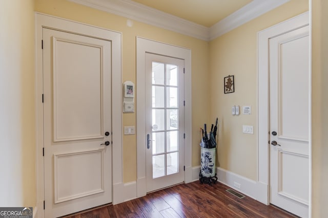 doorway featuring dark hardwood / wood-style floors and ornamental molding