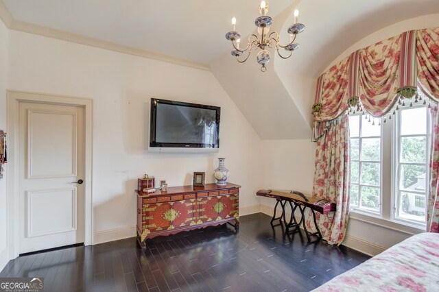 bedroom featuring crown molding, vaulted ceiling, an inviting chandelier, and dark wood-type flooring