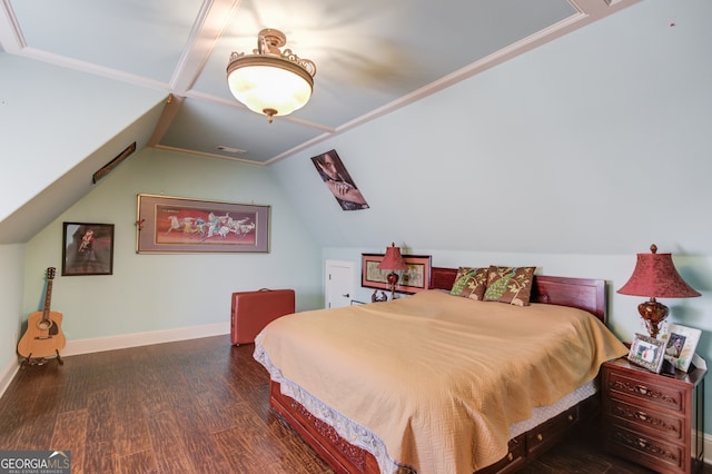 bedroom with vaulted ceiling and dark hardwood / wood-style flooring