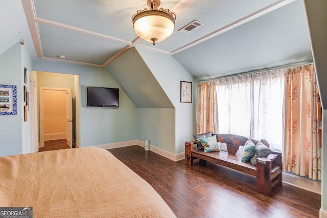 bedroom with lofted ceiling and dark hardwood / wood-style flooring