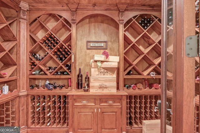 wine room with wooden walls