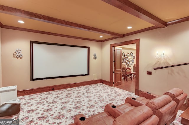 cinema room with beam ceiling