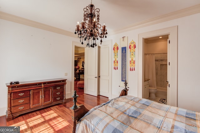 bedroom featuring connected bathroom, ornamental molding, light hardwood / wood-style flooring, and a chandelier